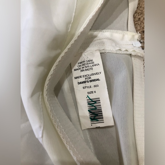 David’s Bridal Spaghetti Strap Layered Wedding Dress with Crinoline Underskirt - Picture 13 of 16